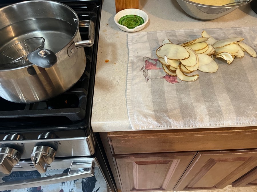 A stir-fry strainer moves them to a clean kitchen towel for draining. No, you don’t need to pat dry and get OCD about it.