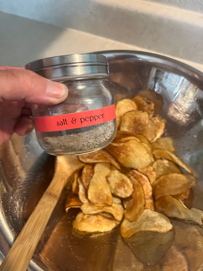 Any seasoning will do. Or none. My favorite is salt and pepper. These 2 mm chips are strong enough for dipping. Saint Julia would be quite proud of what you did in your own kitchen. Bon appétit!
